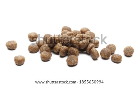 Dog food, dry granules for puppies isolated on white background Royalty-Free Stock Photo #1855650994