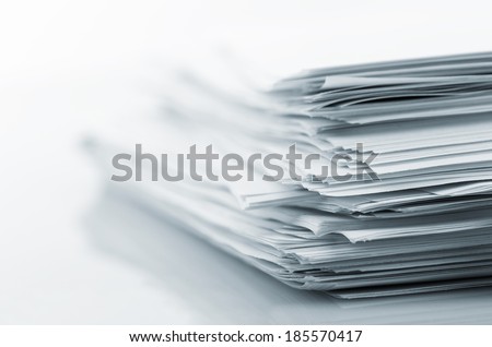 Stack of white papers Royalty-Free Stock Photo #185570417