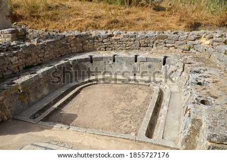 Latrines at the Cyclops Baths. Roman City of Dougga, Tunisia. Royalty-Free Stock Photo #1855727176