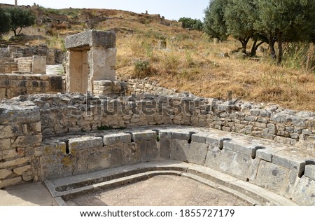 Latrines at the Cyclops Baths. Roman City of Dougga, Tunisia. Royalty-Free Stock Photo #1855727179