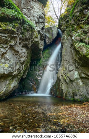 Fotinovo waterfalls (Fotinski waterfall) in Rhodopes Mountain, Pazardzhik region, Bulgaria. Amazing autumn landscape