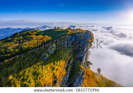 Sunrise and Mist mountain in Phu Chi Fa located in Chiang Rai, Thailand. Phu Chi Fa is the natural border between Thailand and Laos Royalty-Free Stock Photo #1855771996
