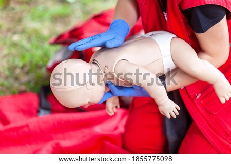 Baby or child first aid training for choking Royalty-Free Stock Photo #1855775098