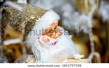 Christmas decoration, Xmas tree ornaments Santa Claus bauble closeup view, winter holiday festive background, greeting card template