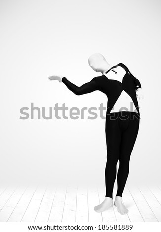 man in full body suit presenting your product over white background