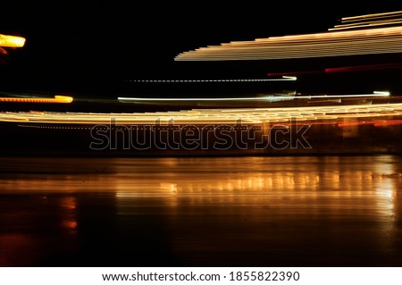 Abstract background of city lights made with long shutter speed. Lights photo art.