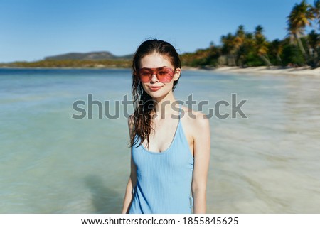 Woman in swimsuit island landscape travel summer tan