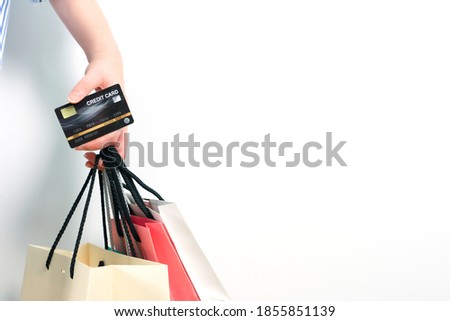 beauty woman hand hold credit card and shopping bag after order discount sale item 