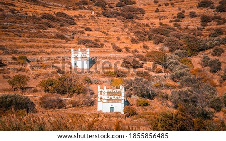 Colorful autumn view of Dovecotes (pigeon houses) in the village of Tarambados, Tinos, Greece