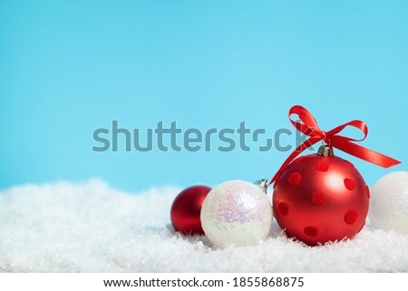 Christmas card with red and white xmas and new year holiday decoration. Celebration and gifts concept with copy space in the top