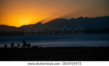photo of the sunset over the mountains 