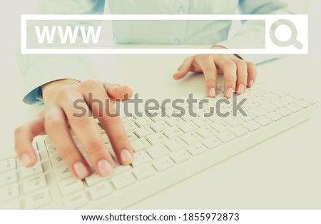 Searching information data on internet networking concept. Hand of male typing text on laptop keyboard