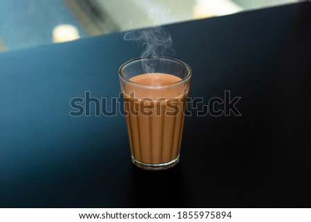 Fresh milk tea or Indian Kadak Chai. Royalty-Free Stock Photo #1855975894