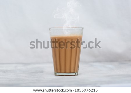 Fresh milk tea or Indian Kadak Chai. Royalty-Free Stock Photo #1855976215