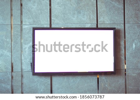 Mock up lcd smart TV or signboard for billboard banner display presentation at event convention exhibit trade show at booth  conference hall, white blank screen background
