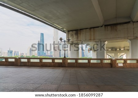 Streets on both sides of the Pearl River and skyline of modern urban buildings in Guangzhou City, Guangdong Province, China