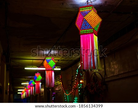 Diwali decorative lamps/Akash Kandil/Lantern lights hanging outside traditional indian home/chawl in Mumbai Royalty-Free Stock Photo #1856134399