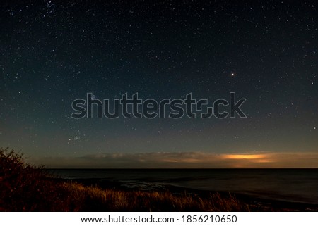 Starry sky over the Baltic Sea