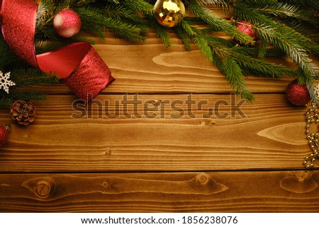 Christmas background with wooden decorations and toys. Free space for text. Celebration and decorative design. High quality photo
