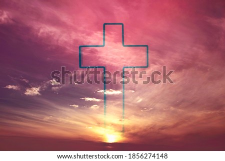 Easter, Ascension day concept. Silhouette of shining cross on sunset, sunrise background. Banner. Copy space. Church worship. Faith symbol. Gate to heaven. Eternal life of soul. Christianity gospel.