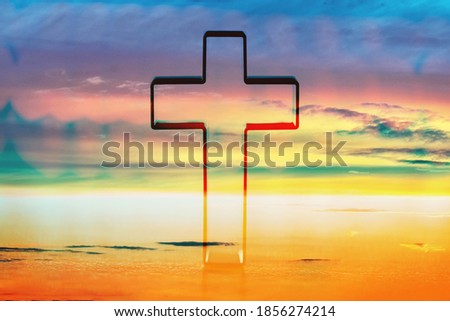 Silhouette of shining cross on sunset, sunrise background. Banner. Copy space. Easter, Ascension day concept. Church worship. Faith symbol. Gate to heaven. Eternal life of soul. Christianity gospel.