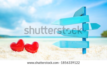 wooden sign on sand beach for outdoor advertising summer vacation concept.