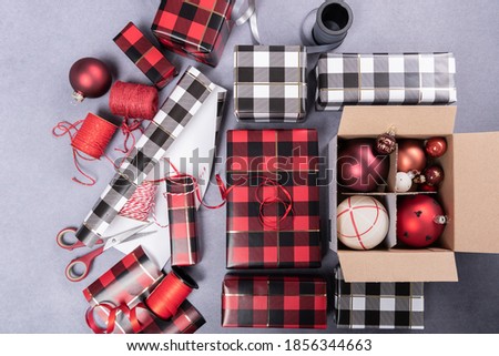 Wrapped gifts for Christmas with wrapping paper with a checkered pattern
