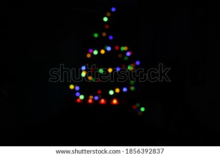 Abstract blurred bokeh lights of Christmas tree