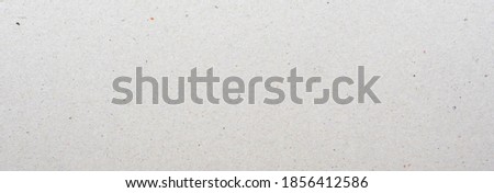 Abstract white recycled paper texture background.
Kraft paper gray box craft pattern seamless.
top view.