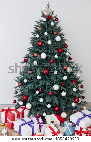 Christmas tree with gifts decor New Year postcard