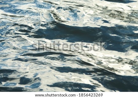 Sea wave close up, low angle view.  blue water during the dawn