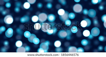 Abstract blue blur bokeh background.  Blue glitter background.
