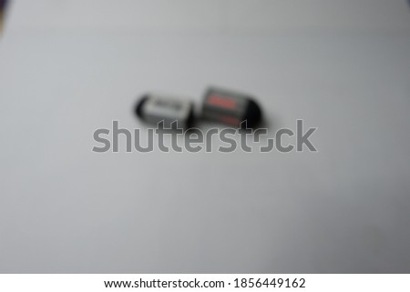 Eraser on a white background. Blur picture camera
