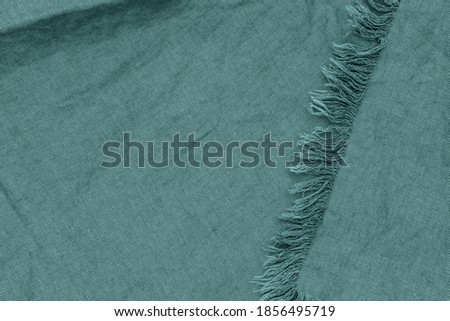 Blue green linen texture background. 2021 Color Trends Tidewater Green. Wrinkled linen fabric backdrop. 