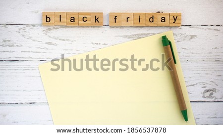 black Friday.words from wooden cubes with letters photo