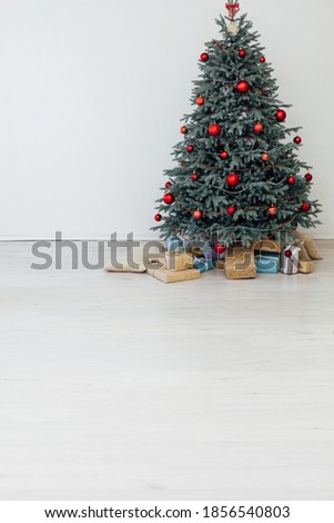 Christmas tree with gifts white decor new year postcard