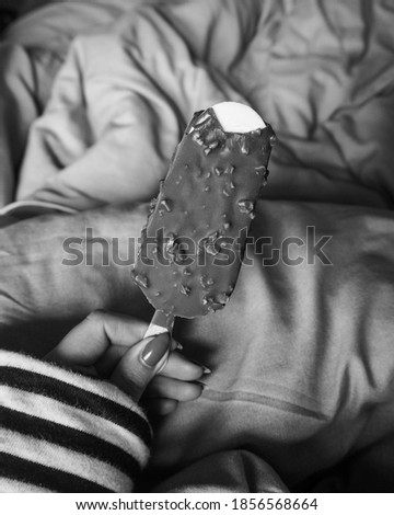 Ice cream chocolate sweet dessert nails hand in bed black and white photography
