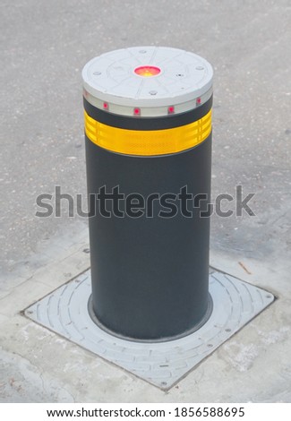 Retractable Electric Bollard Metallic, and hydraulic for the control of road traffic locked up underground