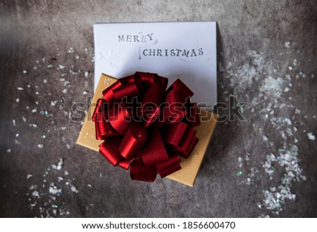 christmas greeting card with wood lollipops and grey grunge background