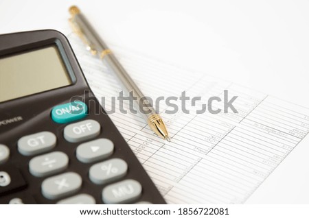  calculator on a graph and white background. High quality photo