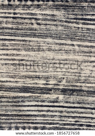 two-color denim fabric. White lines on navy blue background. Textile texture.