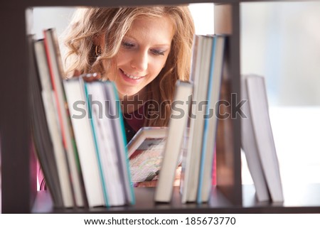 portrait of an  college student studying in the library