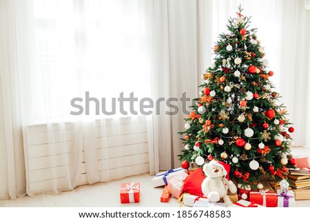 Christmas tree with gifts lights garland decor new year
