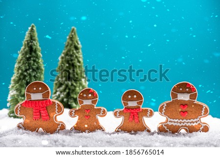 Christmas Festive Greeting Card. Funny Gingerbread Family in Face Mask