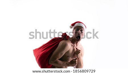 man in Christmas hat with gift box, holiday, christmas background