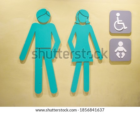 Men,women,disabled and 
small child toilet sign.
