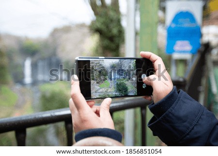 Use a smart phone to take photos of the tour