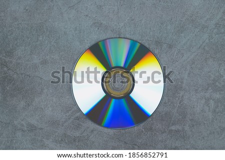 Blank DVD-R on back side isolated on grey background 