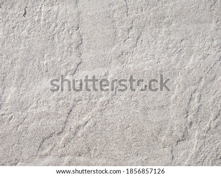 Grey rough stone floor texture.