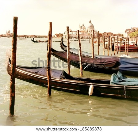 Vintage edited  image from gondola' s in the water by the city of Venice, Italy 